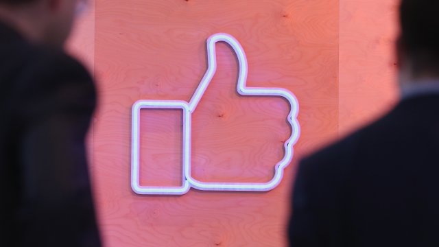 Neon sign of Facebook logo