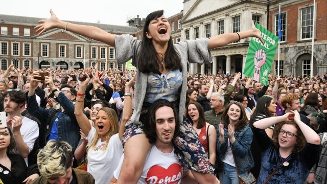 Irish citizens celebrate referendum results.