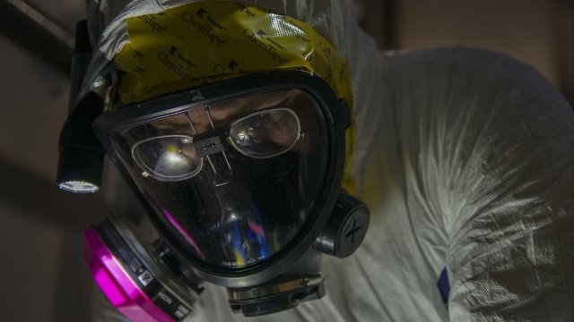 An unnamed Airman particiaptes in a simulated anthrax attack exercise