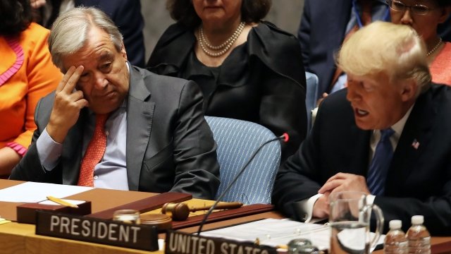 U.N. Secretary-General Antonio Guterres listens as President Donald Trump chairs a U.N. Security Council meeting.