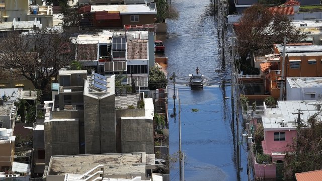 A flooded street is seen as people deal with the aftermath of Hurricane Maria on September 25, 2017 in San Juan Puerto Rico.