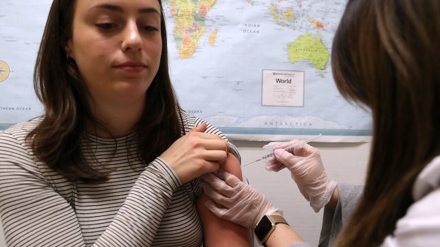 Simone Groper receives a flu shot at a Walgreens pharmacy on January 22, 2018 in San Francisco, California.