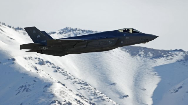 A F-35 fighter jet take-offs for a training mission.