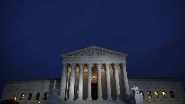Supreme Court building at dusk