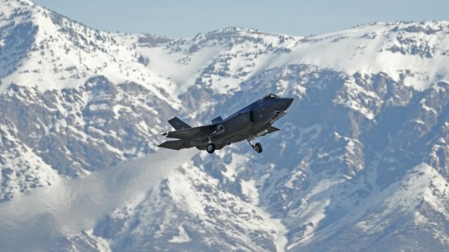 An F-35 fighter jet takes off for a training mission.