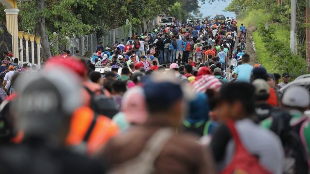 A group of Honduran migrants trek through Guatemala