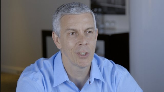 Former Secretary of Education Arne Duncan participates in an interview with Newsy.