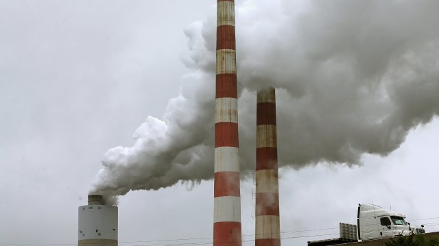 Emissions stacks at a coal-fired power plant