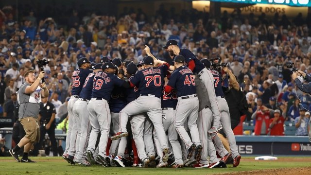 The Boston Red Sox celebrate their 5-1 win over the Los Angeles Dodgers.