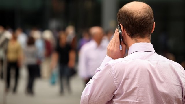 A person talks on a cellphone