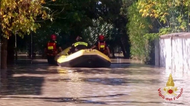 Emergency crews in Italy work to rescue residents trapped in floodwaters
