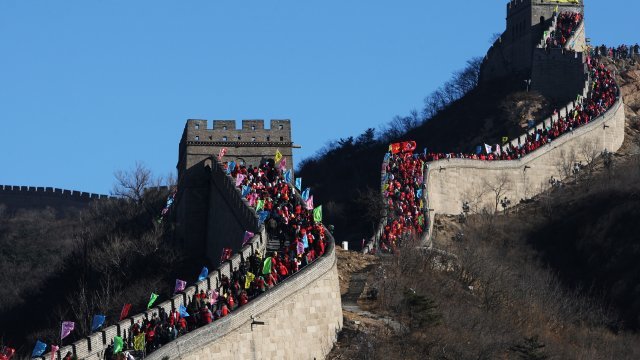 People climb Great Wall of China