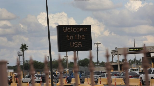 A sign welcomes immigrations to the U.S.