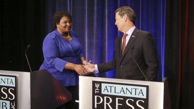 Candidates for Georgia governor Stacey Abrams and Brian Kemp