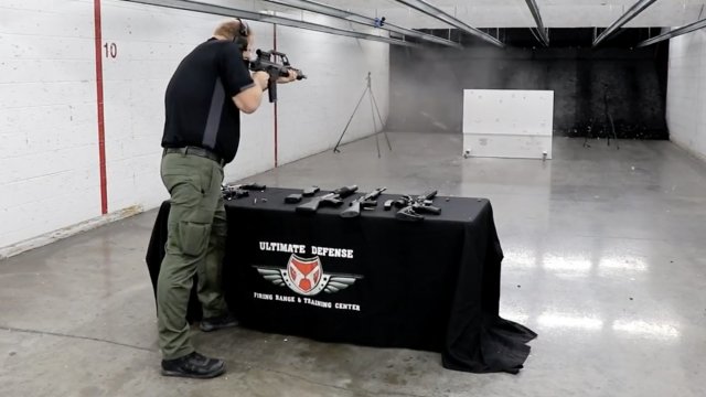Man shoots at bulletproof table.
