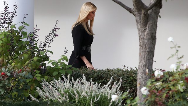 Ivanka Trump walks along the colonnade before watching President Trump depart on Marine One at the White House.