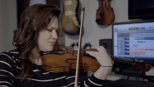 Rebecca Faber plays her violin