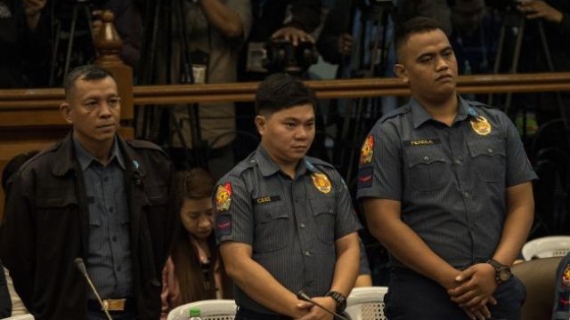 Philippine police officers in court