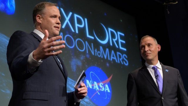 NASA administrators address an audience