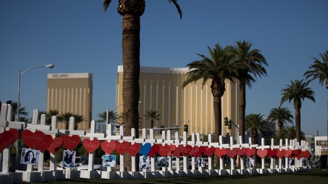 A row of white crosses lined up in memory of the victims of the Las Vegas shooting