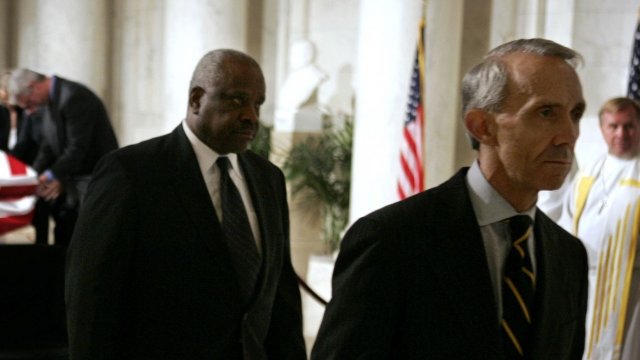 .S. Supreme Court Associate Justices (R-L) David Souter, Clarence Thomas, Ruth Bader Ginsburg depart the Supreme Court.