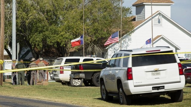 Law enforcement officials gathered around the First Baptist Church of Sutherland Springs