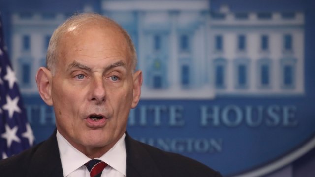 John Kelly addresses members of the media during a press briefing.