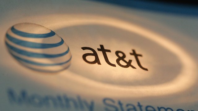 The AT&T logo is seen atop a phone bill