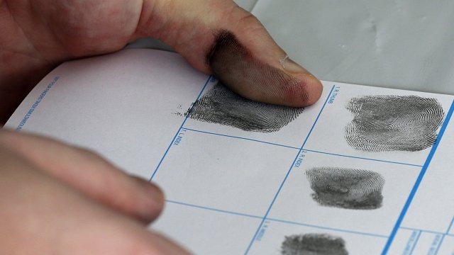 Man getting his fingerprint taken
