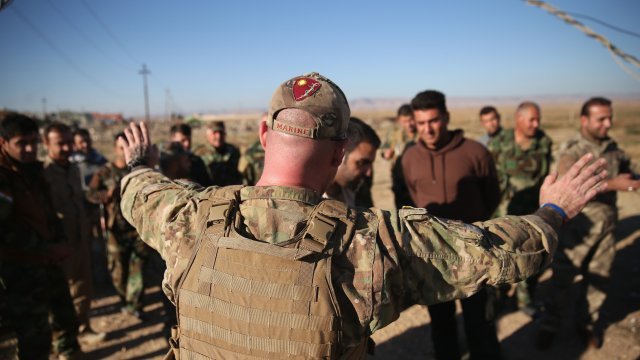 A former U.S. Marine and member of the International Peshmerga Volunteers helps train Iraqi Peshmerga troops