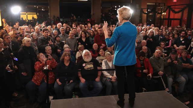 Sen. Elizabeth Warren (D-Mass.) speaks to a crowd in Iowa shortly after announcing her presidential exploratory committee.