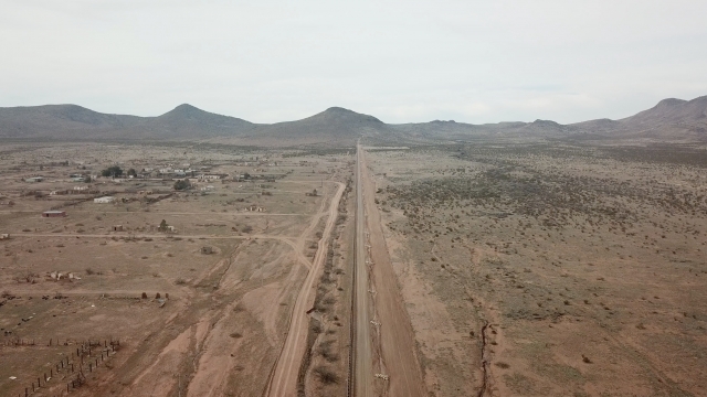 A birds-eye view of the border at the southern end of James Johnson's farm in New Mexico.