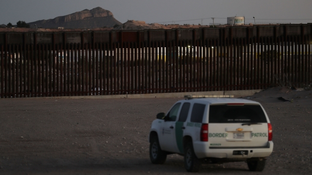 A U.S. Border patrol agent sits in his vehicle near the U.S.-Mexico Border in Sunland Park, New Mexico