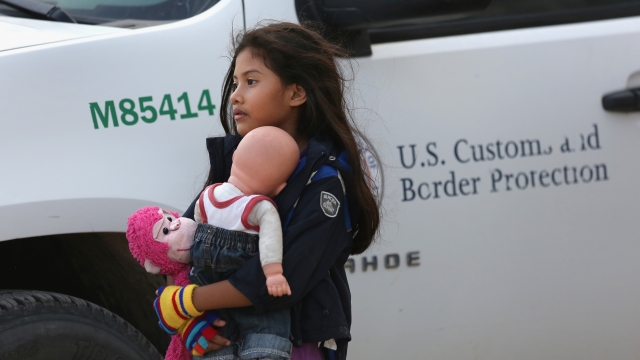Salvadorian immigrant Stefany Marjorie, 8, holds her doll Rodrigo while going home on July 24, 2014 in Mission, Texas.