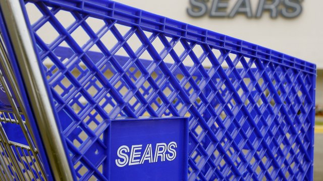 A Sears shopping cart is seen outside its store.