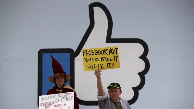 Protestors demonstrate outside of Facebook's Menlo Park location in April 2018