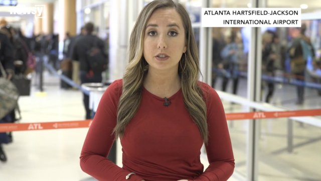 newsy reporter alex miller in atlanta airport