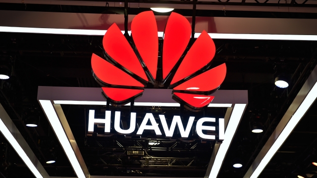 The Huawei logo is display during CES 2018.