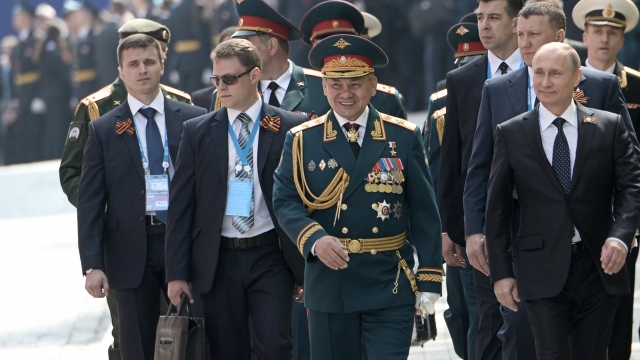 Russian President Vladimir Putin and Russian Defense Minister Sergei Shoigu attending a military parade