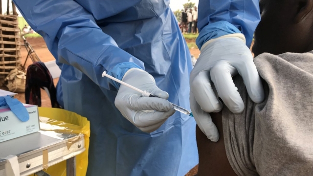 A person receives the Ebola vaccine