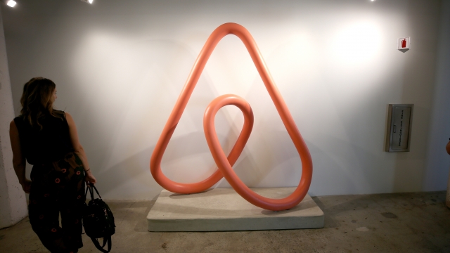 An Airbnb logo on display