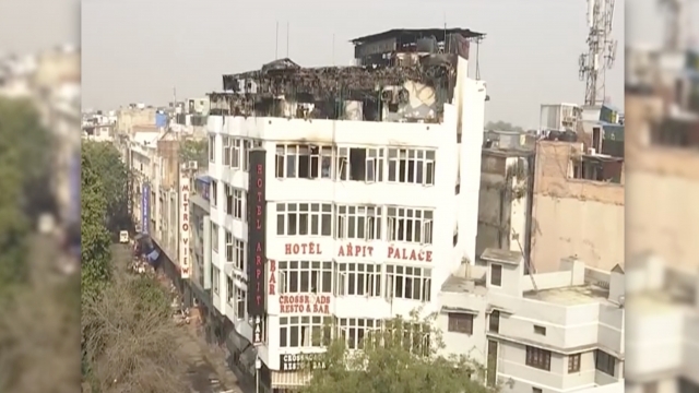 The charred remains of the Hotel Arpit Palace in New Delhi