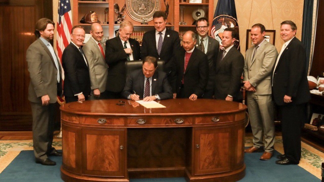 Utah Gov. Gary Herbert signing bill into law