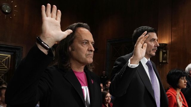 T-Mobile CEO John Legere and Sprint Executive Chairman Marcelo Claure are sworn in during a Senate hearing