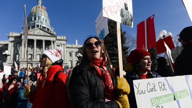 Teachers in Denver strike at the capitol building.
