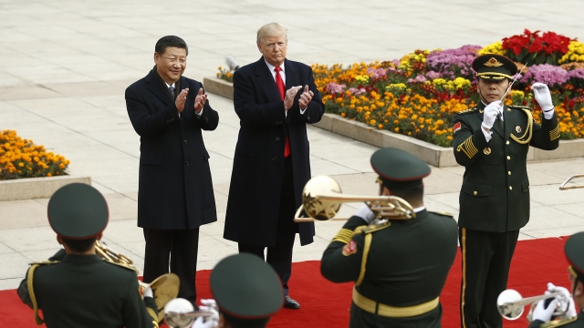 President Trump standing nearby President Jinping
