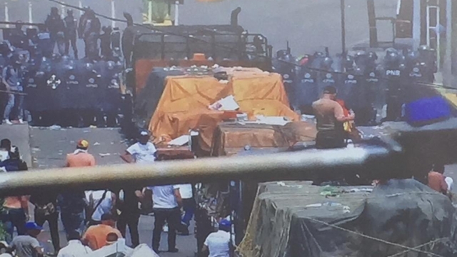 Trucks of humanitarian aid are blocked inside Venezuela