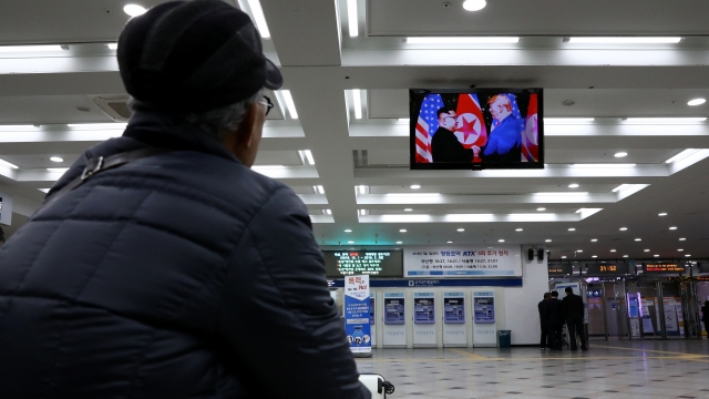 A South Korean man watches a screen reporting on the U.S. President Trump meeting with North Korean leader Kim Jong-un