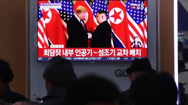 South Koreans watch a screen reporting on the U.S. President Trump meeting with North Korean leader Kim Jong-un.