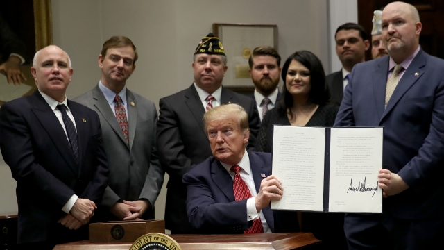 President Donald Trump signs executive order